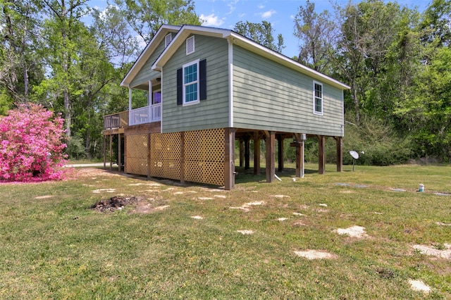 view of property exterior featuring a lawn