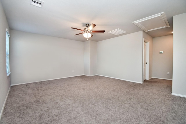 empty room featuring ceiling fan and carpet floors