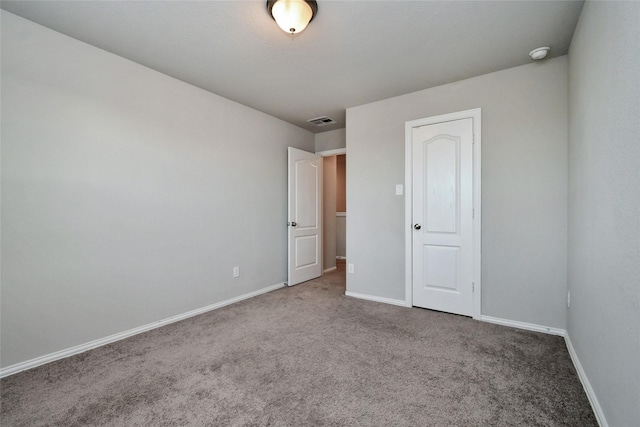 unfurnished bedroom featuring carpet floors