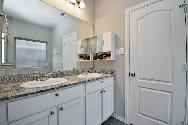 bathroom featuring vanity