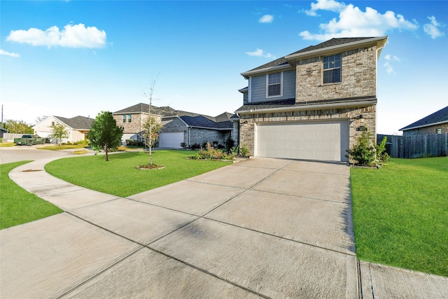 view of front of property with a front lawn and a garage