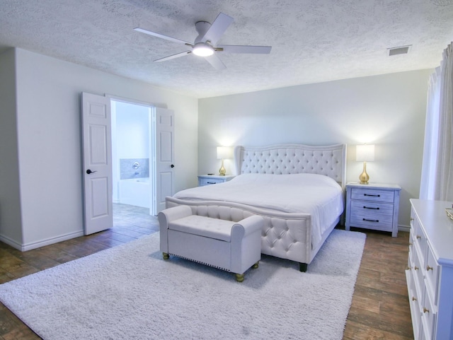 bedroom featuring a textured ceiling, ceiling fan, and dark wood-type flooring