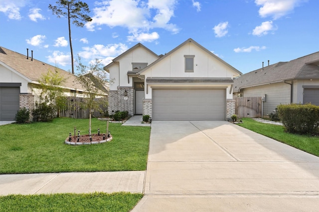 view of front of home featuring a front yard and a garage