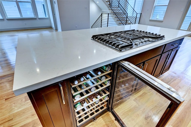 kitchen featuring light wood-type flooring and stainless steel gas stovetop