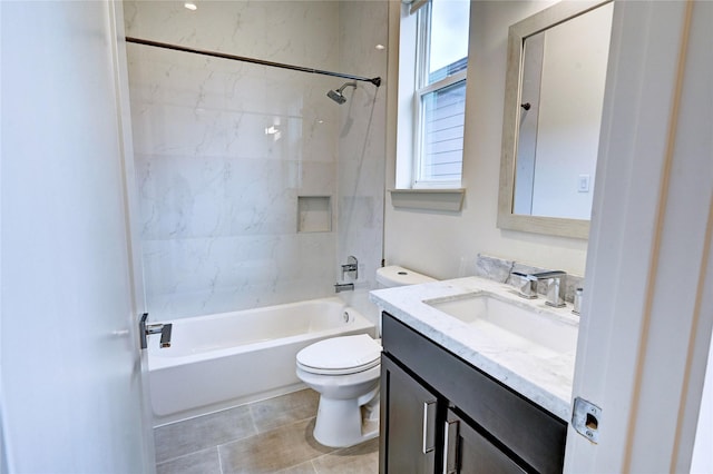 full bathroom featuring vanity, toilet, and tiled shower / bath combo