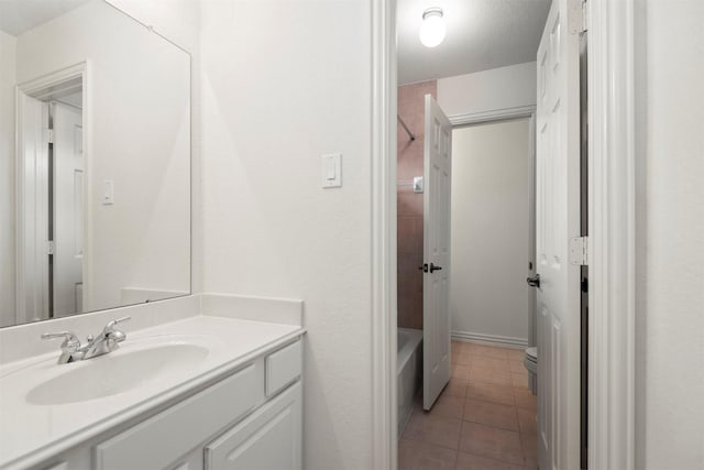 bathroom featuring tile patterned floors and vanity