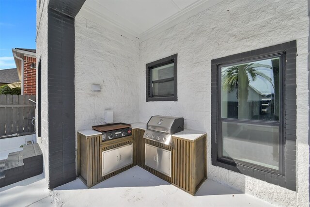 view of patio / terrace with exterior kitchen and grilling area