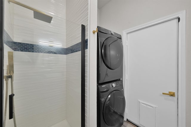 laundry room featuring stacked washer / dryer