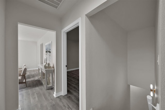 hallway featuring light hardwood / wood-style flooring