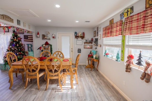 dining space featuring light hardwood / wood-style floors