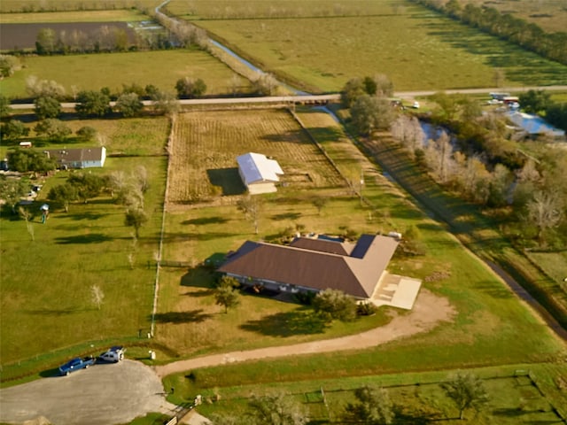 birds eye view of property featuring a rural view