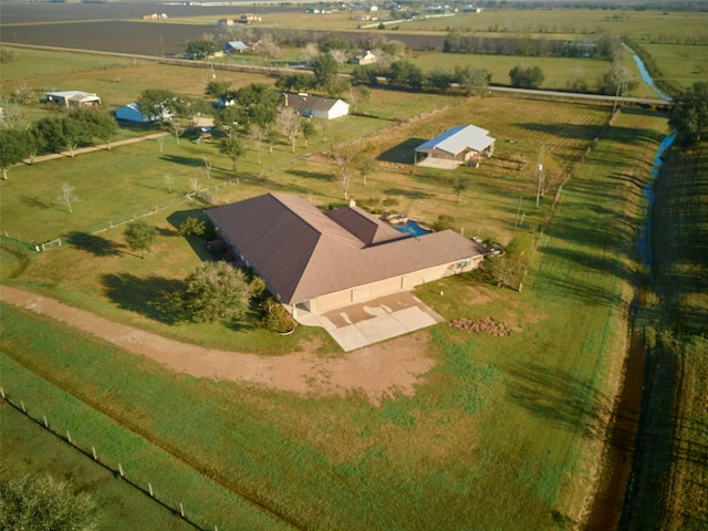 birds eye view of property featuring a rural view