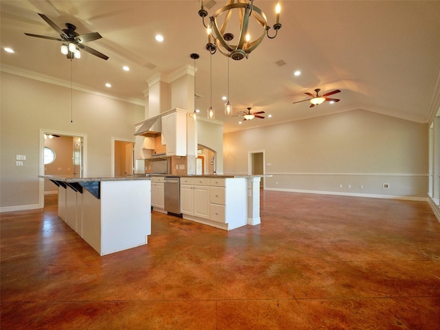 kitchen with white cabinets, a kitchen island, hanging light fixtures, and a breakfast bar area