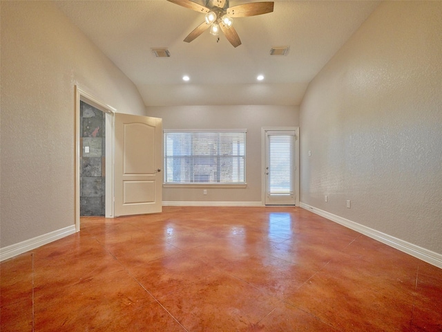 unfurnished room with ceiling fan and vaulted ceiling