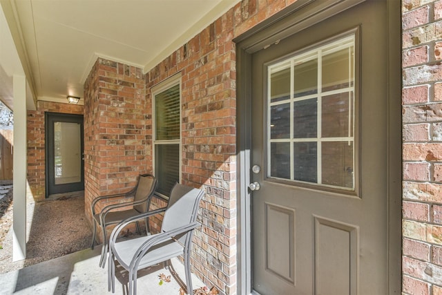 entrance to property with covered porch