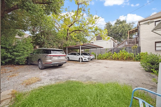 view of parking with a carport