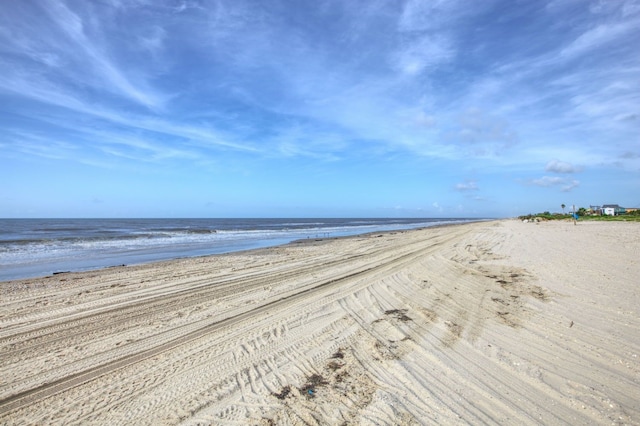 view of water feature with a beach view