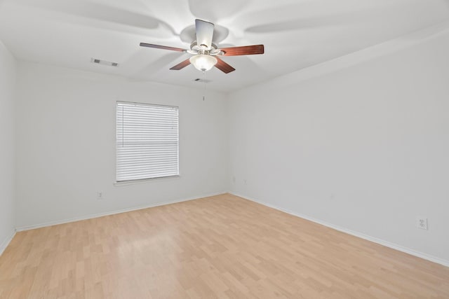 unfurnished room featuring ceiling fan and light hardwood / wood-style floors