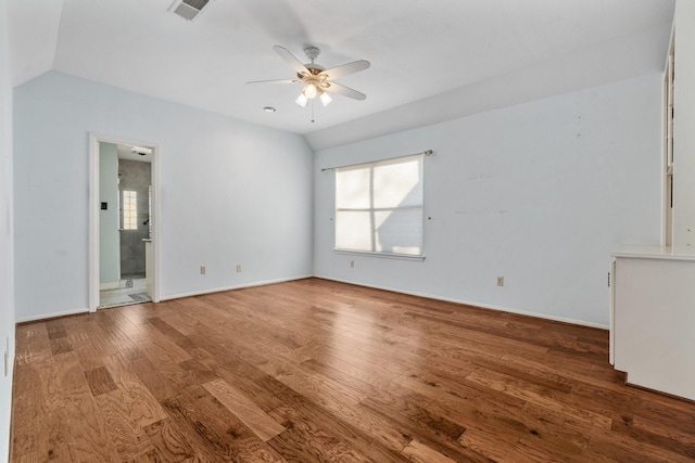 unfurnished living room featuring hardwood / wood-style flooring, ceiling fan, and lofted ceiling