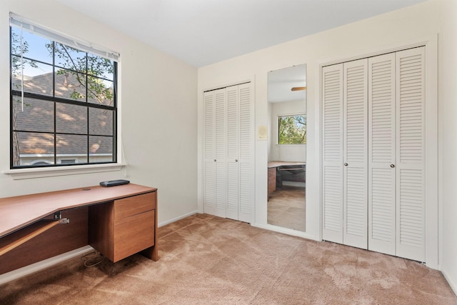 view of carpeted home office