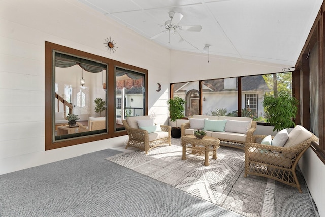 sunroom featuring ceiling fan