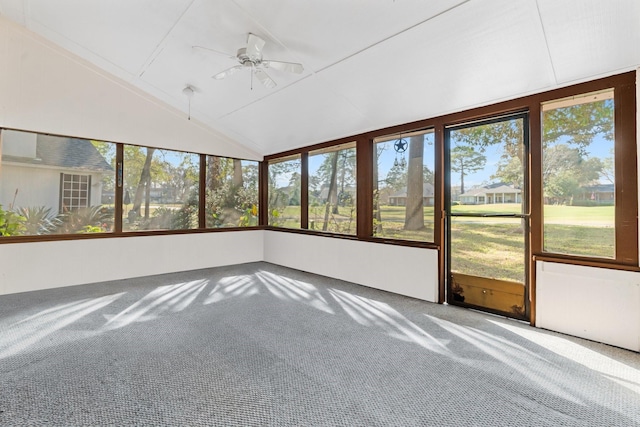 unfurnished sunroom with ceiling fan and lofted ceiling