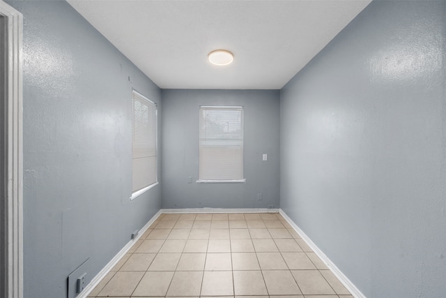 view of tiled spare room