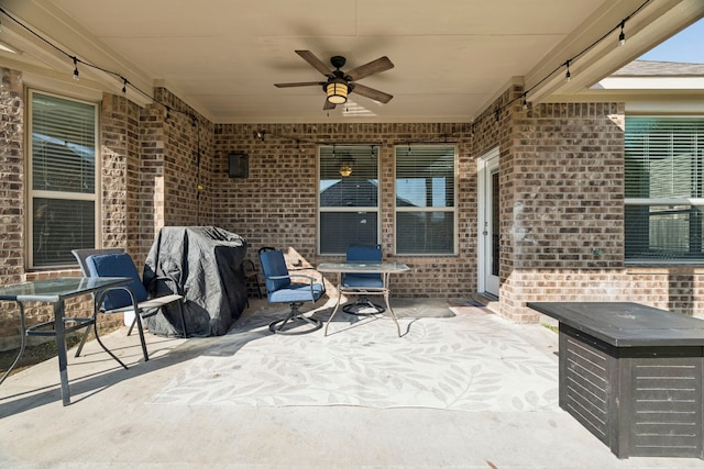 view of patio / terrace with grilling area and ceiling fan