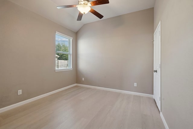 2206 Wolf Creek Ct, Katy, TX 77493 - empty room with light wood-style floors, ceiling fan, lofted ceiling, and baseboards