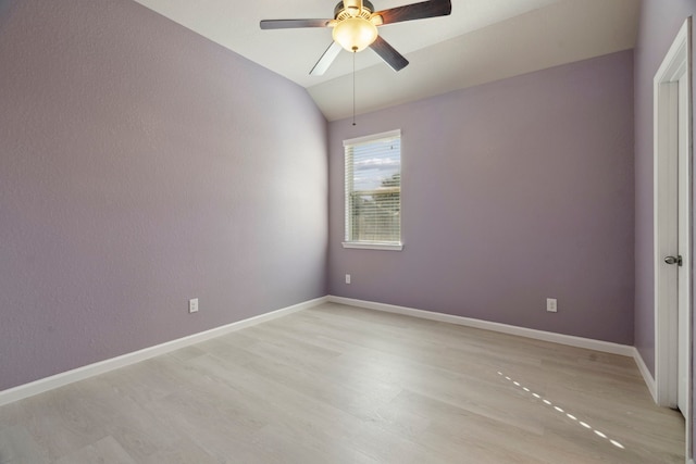 2206 Wolf Creek Ct, Katy, TX 77493 - unfurnished room with light wood finished floors, ceiling fan, lofted ceiling, and baseboards