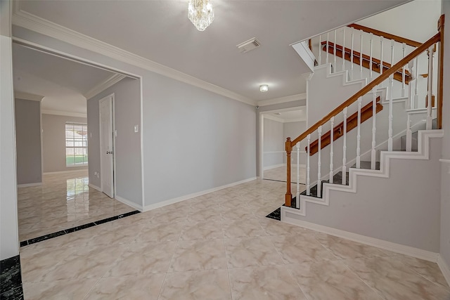 foyer featuring crown molding