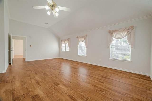 interior space with ceiling fan, lofted ceiling, and light hardwood / wood-style flooring