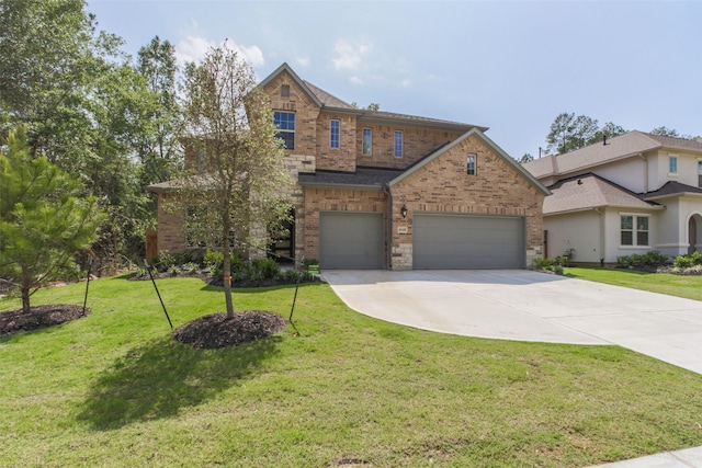 16146 Rustling Woods Rd, Conroe, TX 77302 - view of front of property featuring brick siding, driveway, a front lawn, and a garage