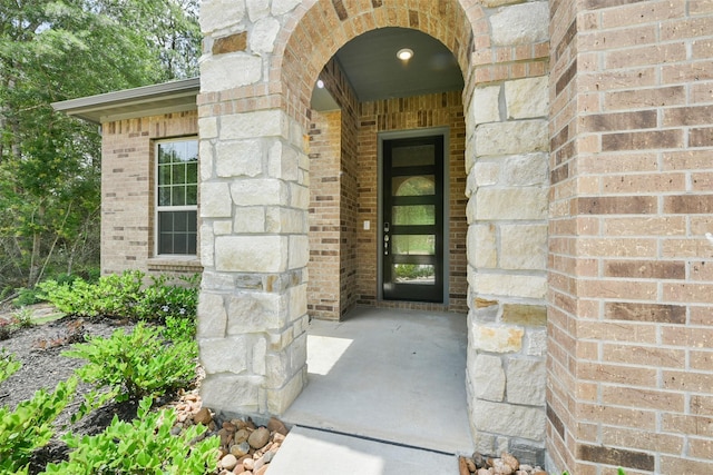 16146 Rustling Woods Rd, Conroe, TX 77302 - entrance to property with brick siding