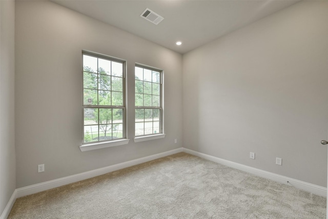 16146 Rustling Woods Rd, Conroe, TX 77302 - empty room featuring carpet floors and recessed lighting