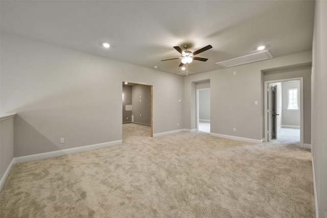 16146 Rustling Woods Rd, Conroe, TX 77302 - spare room with attic access, a ceiling fan, light colored carpet, and recessed lighting