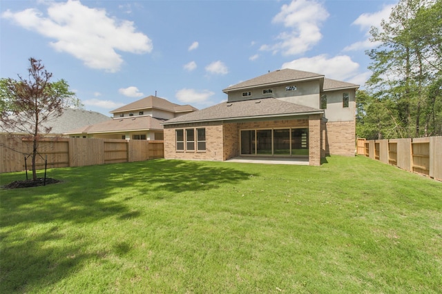 16146 Rustling Woods Rd, Conroe, TX 77302 - back of property featuring a fenced backyard and a patio