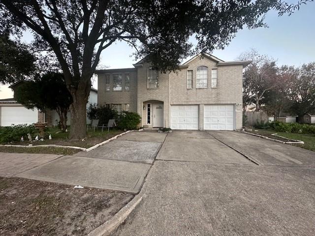 front of property with a garage