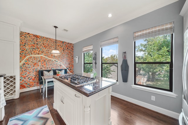 kitchen with white cabinetry, dark hardwood / wood-style flooring, and hanging light fixtures