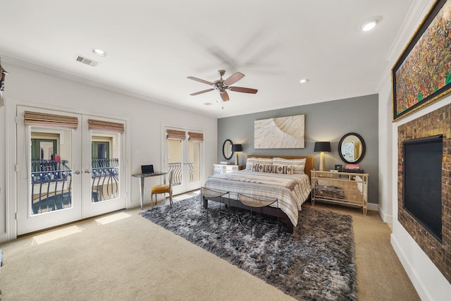 carpeted bedroom with access to outside, ceiling fan, french doors, and ornamental molding