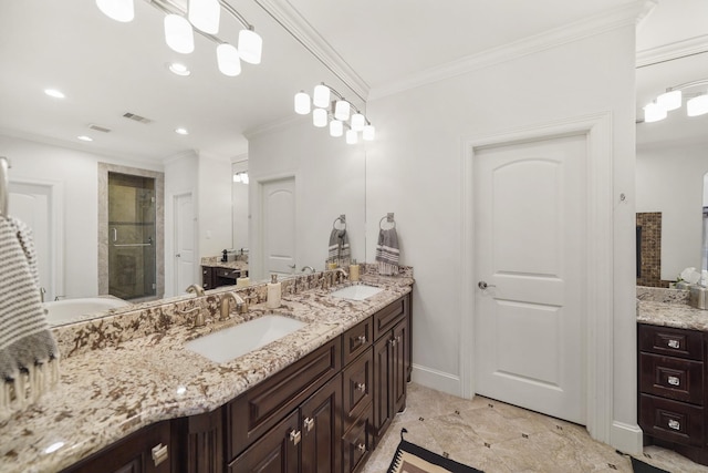 bathroom with vanity, an enclosed shower, and crown molding