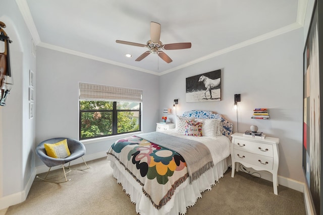 bedroom with ceiling fan, crown molding, and carpet