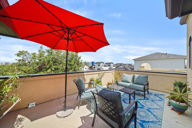 view of patio / terrace featuring a balcony and an outdoor hangout area