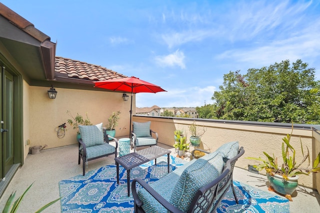 view of patio / terrace featuring a balcony