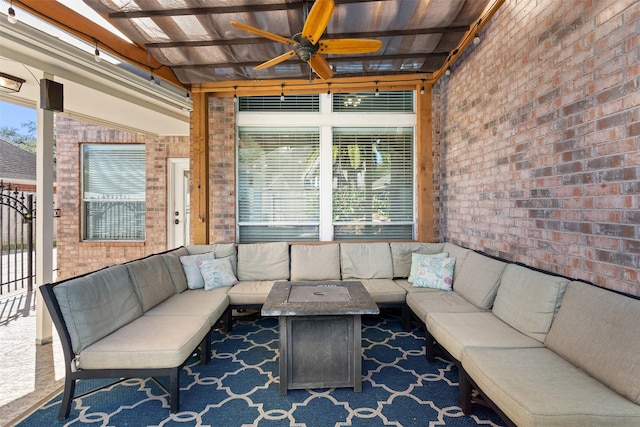 interior space featuring beam ceiling and ceiling fan