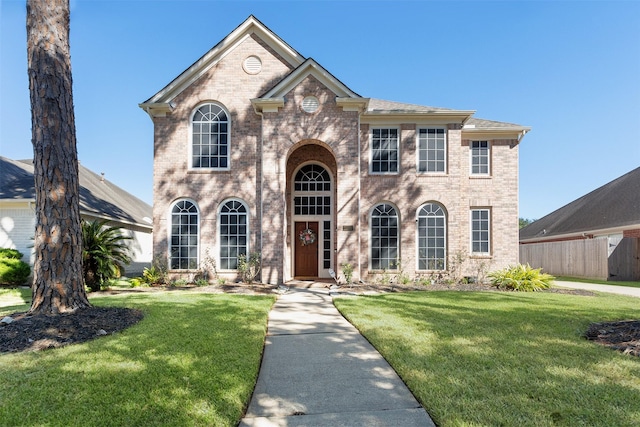 view of front of property with a front lawn