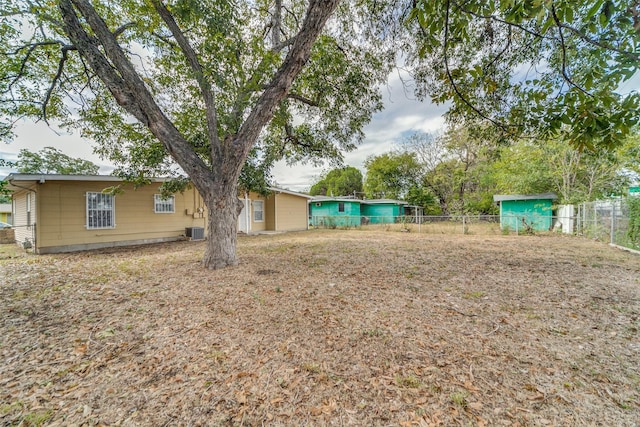 view of yard featuring central AC