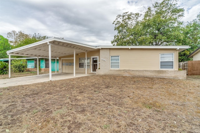 rear view of house with a carport