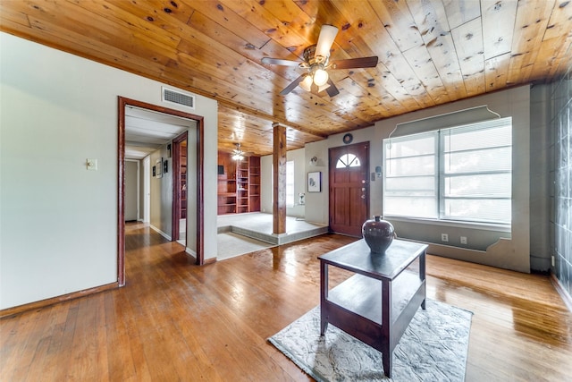 living room with ceiling fan, wooden ceiling, and hardwood / wood-style flooring