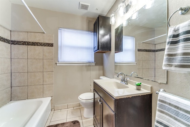 full bathroom featuring tile patterned flooring, shower / bathing tub combination, vanity, and toilet